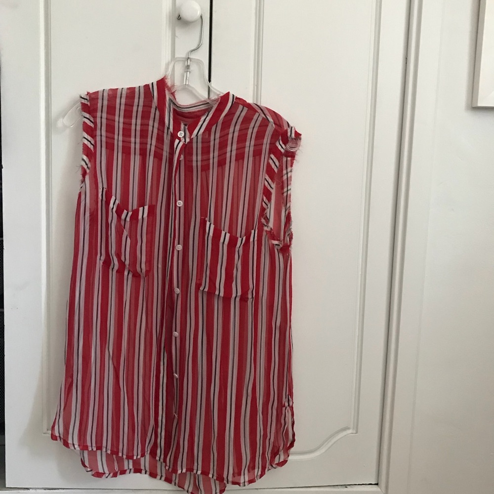 Equipment red and white sheer sleeveless top.